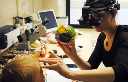 Doctor working with a child with IN